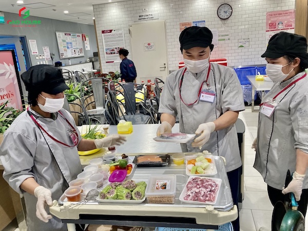 May đồng phục Aeon